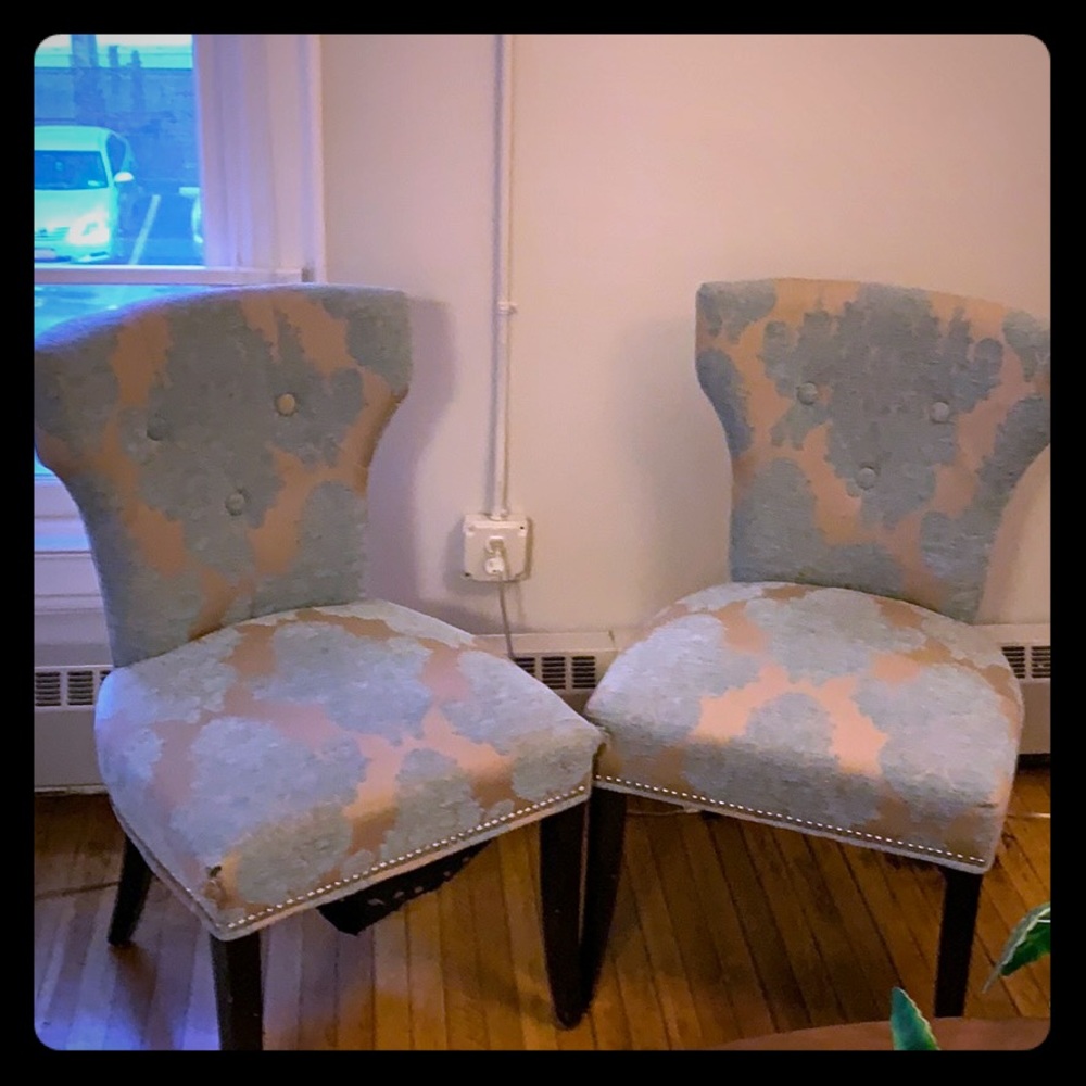 A pair of antique chairs